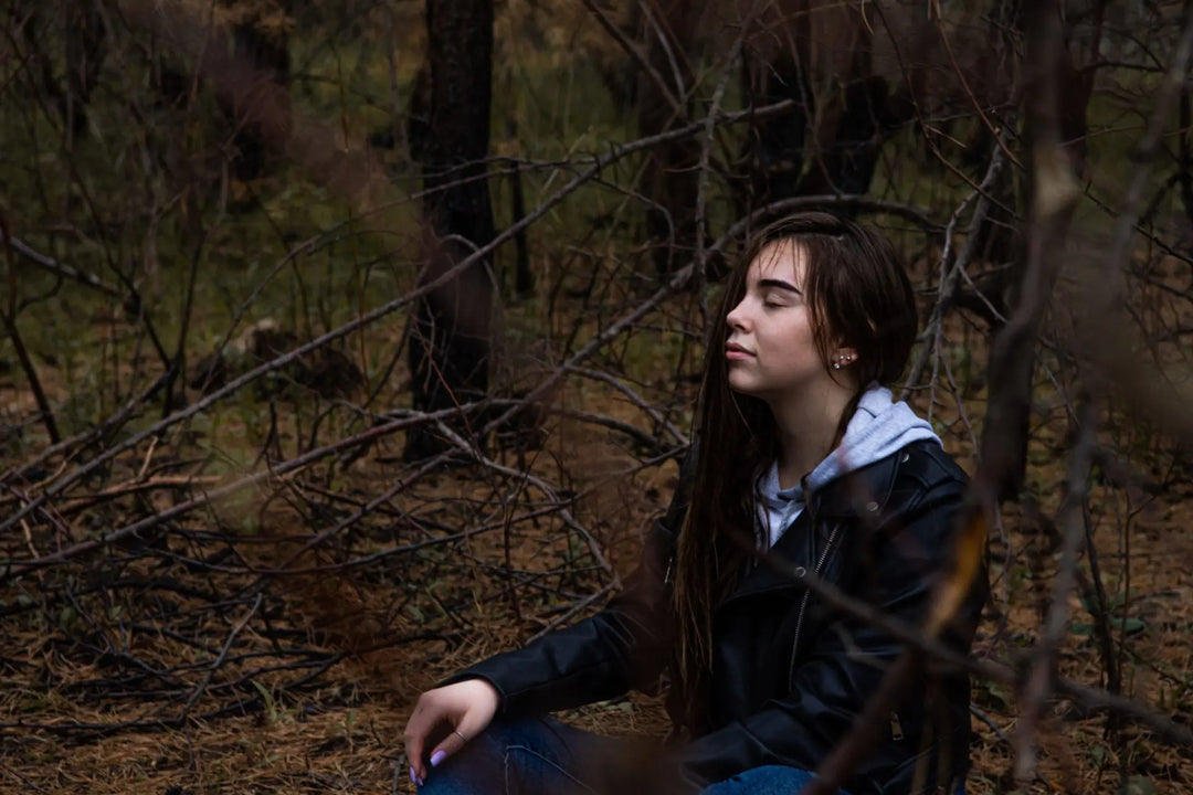 Person in deep meditation for mental well-being.